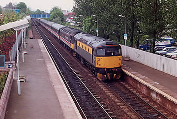 26036 hauls a failed 47593 on the Clansman, seen at Falkirk on 17/05/91. TZ